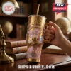 BTS x BT21 Cosmic Friends gold stainless steel handle tumbler featuring purple character graphics and a metal straw.