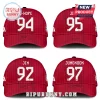 Red baseball caps featuring BTS member names J-Hope, Jimin, Jin, Jungkook with birth years and signatures on striped fabric.!