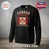 Canada Strong Maple Leaf Paw Black Sweatshirt featuring a red flag emblem with a white paw print graphic on black fabric.