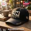 Cartoon Network EST 1992 black baseball cap featuring an embroidered CN logo and text on a wooden cafe table.