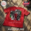 Red soccer jersey featuring Cristiano Ronaldo photo collage with years 2006 to 2026 and Portugal text on wooden background.!