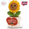 Crochet sunflower plush in a white yarn pot with a red heart-shaped sign reading A tiny sunflower to say I love you.!