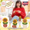 Crochet sunflower in a cream-colored pot with a red heart tag reading Remember I Love You Mom on a woman knitting.!