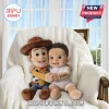 Custom Liam Woody Cowboy Shaped Plush Pillow sitting on a white chair next to a personalized baby doll named Liam.