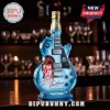 Bombay Sapphire London Dry Gin bottle shaped like a blue electric guitar featuring a David Bowie Aladdin Sane portrait.!