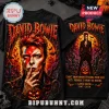 David Bowie Halloween Costume 2026 T-Shirt featuring Ziggy Stardust, a glowing pumpkin, and a graveyard sunset scene.