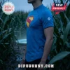 DC Comics Superman Blue Compression T-Shirt worn by a man standing in a cornfield with the red and yellow logo.
