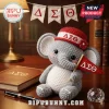 Crocheted gray elephant plush wearing a red hat with Delta Sigma Theta symbols and holding a matching red flag.!