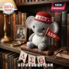 Crocheted gray elephant wearing a red hat with Delta Sigma Theta Greek letters holding a matching red felt pennant flag.!