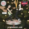 Depeche Mode 2026 Christmas ornament featuring miniature figurines of Dave Gahan and Martin Gore on a circular display base.