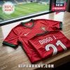 Portugal national football team jersey with red wavy pattern, green trim, Nike logo, and Diogo J. number 21 printing.!