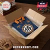 Blue and orange Dragon Ball Z Goku soccer jersey inside a cardboard box with bubble wrap on a wooden desk.!