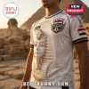 White Egypt soccer jersey featuring gold pharaoh mask print, hieroglyphics, 2026 text, and Egyptian flag shield emblem.!