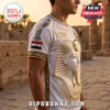 White t-shirt featuring a gold 3D Tutankhamun mask, Egyptian flag patch, 2026 text, and hieroglyphic sleeve patterns.!