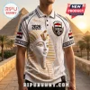 White polo shirt featuring a gold Tutankhamun mask graphic, Egypt national football crest, and hieroglyphic patterns.!