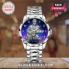 Elvis Presley commemorative analog watch with blue gradient dial, silver guitar figure, and stainless steel link band.!