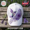 Embroidered Lavender Hummingbird Alzheimer’s Awareness Baseball Cap with purple flowers on a white fabric base.