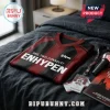 Enhypen graphic v-neck jersey in red and black with One Two Connect text, shown on a dark gray bed with k-pop accessories.!