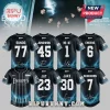 ENHYPEN Blood Saga baseball jerseys with member names, numbers, signatures, and cosmic blue patterns on a black fabric.!