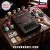 Enhypen Dark Blood box set surrounded by miniature vinyl figures, animal stickers, and keychains on a rustic wooden trunk.!