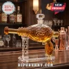 Fallout Nuka Cola glass ray gun whiskey decanter on a stand with 30th Anniversary 1997-2027 engraving on a wood bar.!