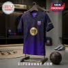 FC Barcelona purple jersey with gold Spotify logo on hanger in a locker room setting with a vintage leather soccer ball.!