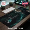 Final Fantasy VII gaming mousepad featuring Cloud Strife on a black and teal background on a wooden desk with keyboard.!
