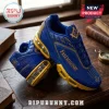 Blue and gold Freemasonry sneakers with square and compass symbols on a dark wooden desk with antique books.!