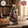 Faceted crystal bust of Gene Simmons from KISS with black hair, face paint, and red tongue, on a base with inscribed text.!