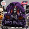 Ghost Band Halloween Beanie Hat 2026 featuring Papa Emeritus, purple knit fabric, jack-o-lanterns, and graveyard scenery.