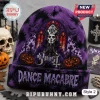 Ghost Halloween Beanie Hat 2026 featuring Papa Emeritus, graveyard scene, pumpkins, and Dance Macabre text in purple knit.