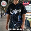 Godzilla Minus One Los Angeles Dodgers black baseball jersey featuring a Godzilla graphic and blue stadium piping.