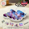White foam clogs featuring GTA VI branding, palm trees, and removable game-themed charms on a white faux fur rug.!