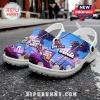 White foam clogs featuring GTA VI branding, palm tree silhouettes, Rockstar Games logo, and character charms.!