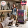 PVC action figure of a man in a blue button-down shirt and cargo pants holding a silver handgun on a wooden display base.!