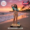 Resin figurine of a woman in a bikini and crop top holding a drink on a beach base with a lifeguard stand model.!