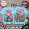 Light blue t-shirts featuring Grateful Dead dancing bear graphics, rainbow arches, and floral patterns on a gray background.!