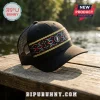 Black trucker hat with mesh back, Grateful Dead lightning bolt emblem, and a vibrant colorful geometric woven band.!