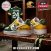 Custom Green Bay Packers themed sneakers with white, yellow, and green leather, number 24, and text on wooden bench.!