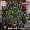 Mechanical wall clock surrounded by ten miniature Gundam model kits on a wood-grain display board.!