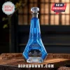 Halo themed blue glass decanter with lightning patterns and 25th anniversary text on a wooden surface.!