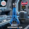 Blue glass decanter with Halo Master Chief helmet emblem, 25th anniversary text, and lightning etchings on dark surface.!