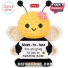Crocheted yellow and black bee plush holding a sign reading Mom-to-bee You are going to bee an AMAZING MOM.!