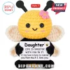 Crochet bee plush toy with yellow head, black body, pink flower, and a sign reading Daughter Life is sweeter with you.!