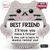 Grey crochet cat plush toy holding a sign that says Best Friend I love you meow and forever with black button eyes.!