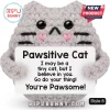 Grey crochet cat plush holding a white sign that reads Pawsitive Cat and motivational affirmations on a white background.!
