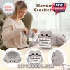 Grey crochet cat plush holding a sign reading Godmother I'll love you meow and forever with pink cheeks and black eyes.!