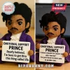 Crocheted Prince doll with black curly yarn hair wearing a purple coat, holding signs with musical song lyrics.!