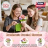 Mother and daughter crocheting a potted plant with pink, purple, and white yarn flowers on a beige sofa.!