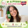 Woman holding a green crochet emotional support pickle plushie with sunglasses and a sign reading Emotional Support Pickle.!